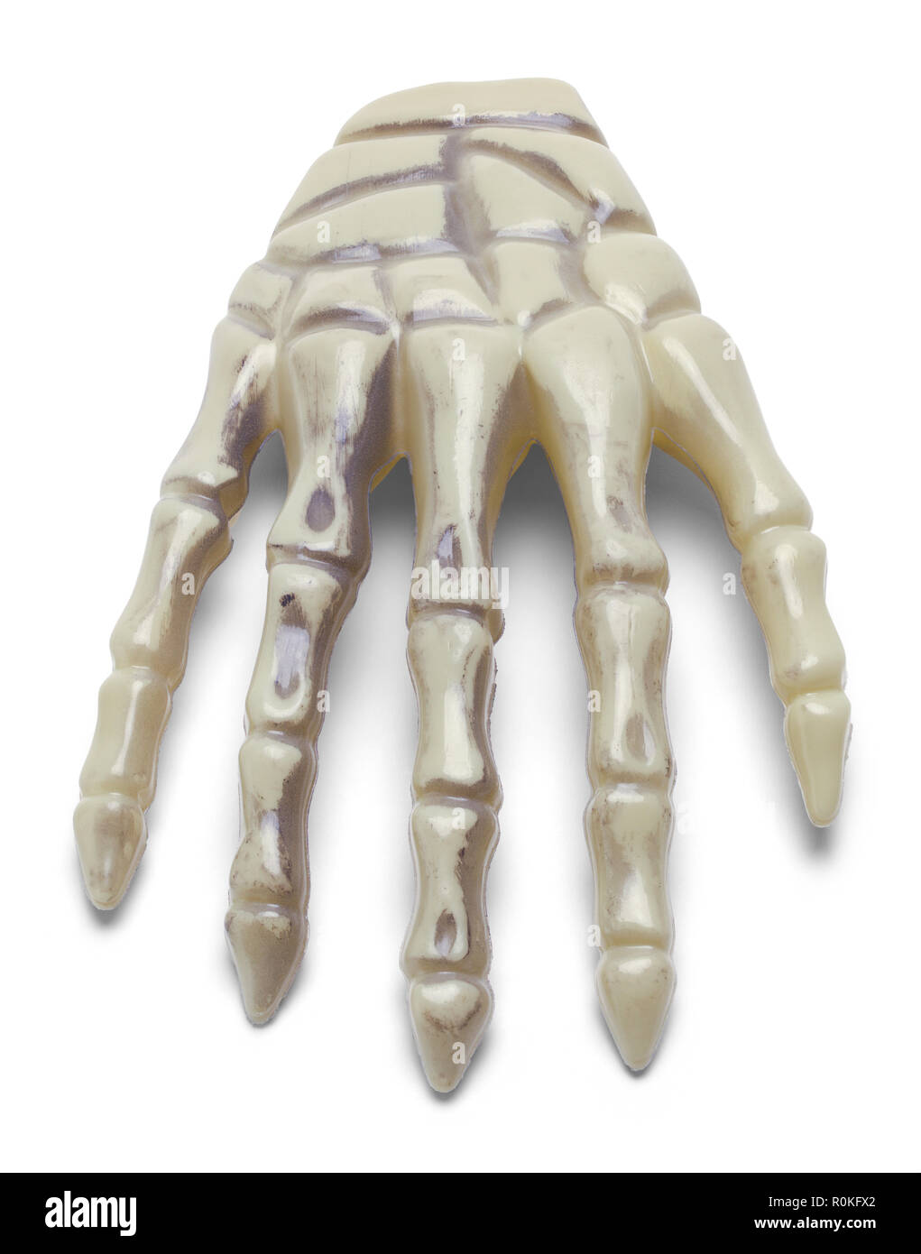 Halloween Kunststoffgerüst Hand isoliert auf einem weißen Hintergrund. Stockfoto