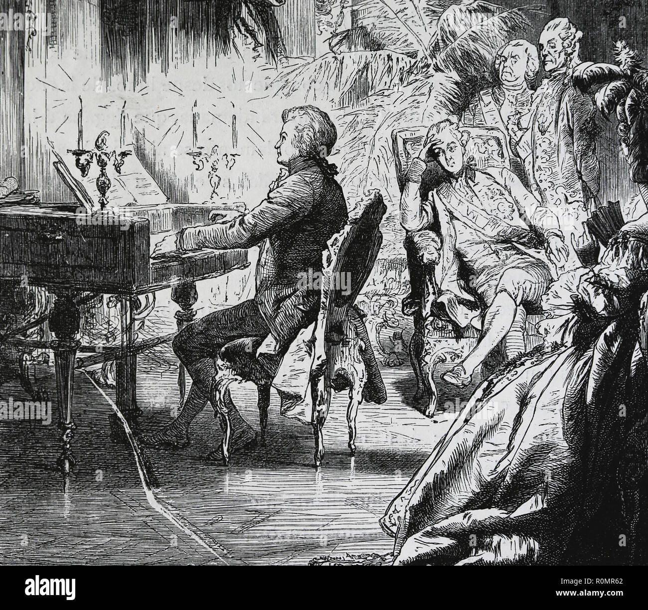 Mozart (1756-1791) Klavier spielen mit der kaiserlichen Familie (Joseph II., Kaiser des Heiligen Römischen Reiches). Wien. Gravur der Germania, 1882 Stockfoto
