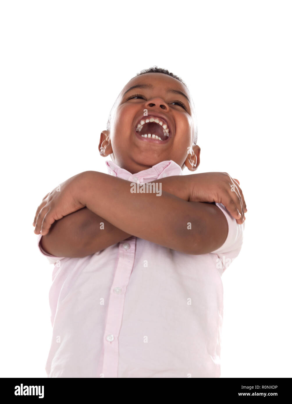 Latin lachendes Kind auf weißem Hintergrund Stockfoto
