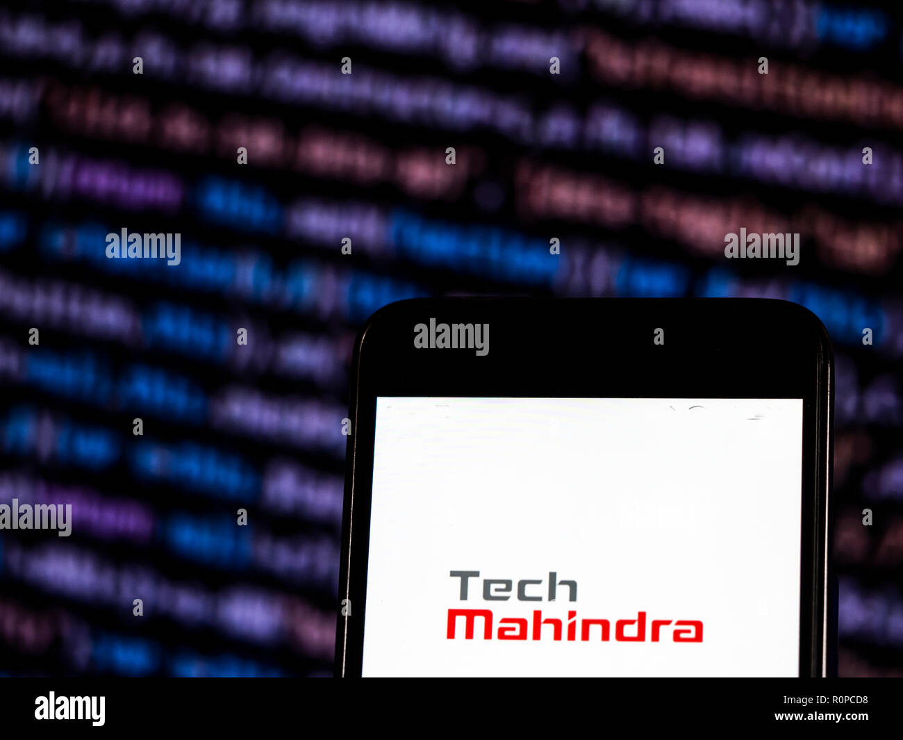 Tech Mahindra Information Technology Company Logo auf dem Smartphone angezeigt. Tech Mahindra beschränkt ist eine Indische multinationaler Anbieter von Informationstechnologie, Networking Technology Solutions und Business Process Outsourcing zu verschiedenen Vertikalen und Horizontalen. Stockfoto