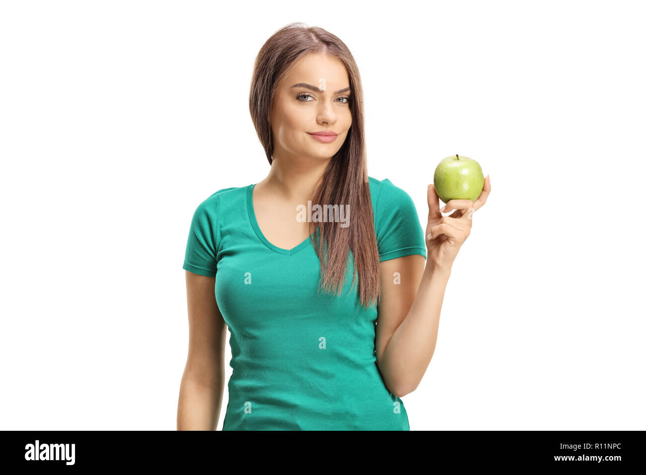 Schöne junge Frau mit einem Apfel Grün auf weißem Hintergrund Stockfoto