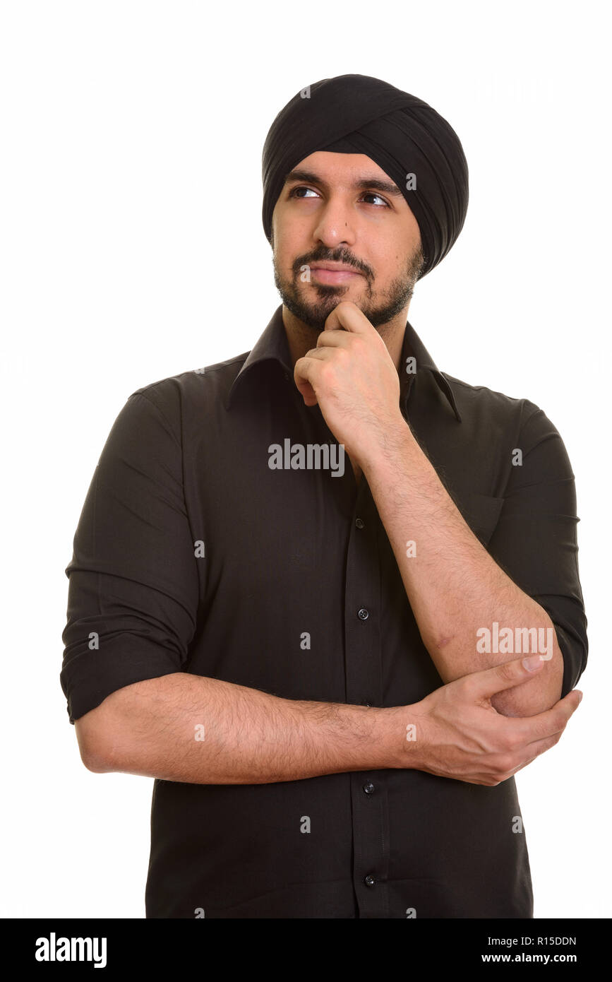 Porträt der jungen schönen Indischen Sikh männliche Denken Stockfoto