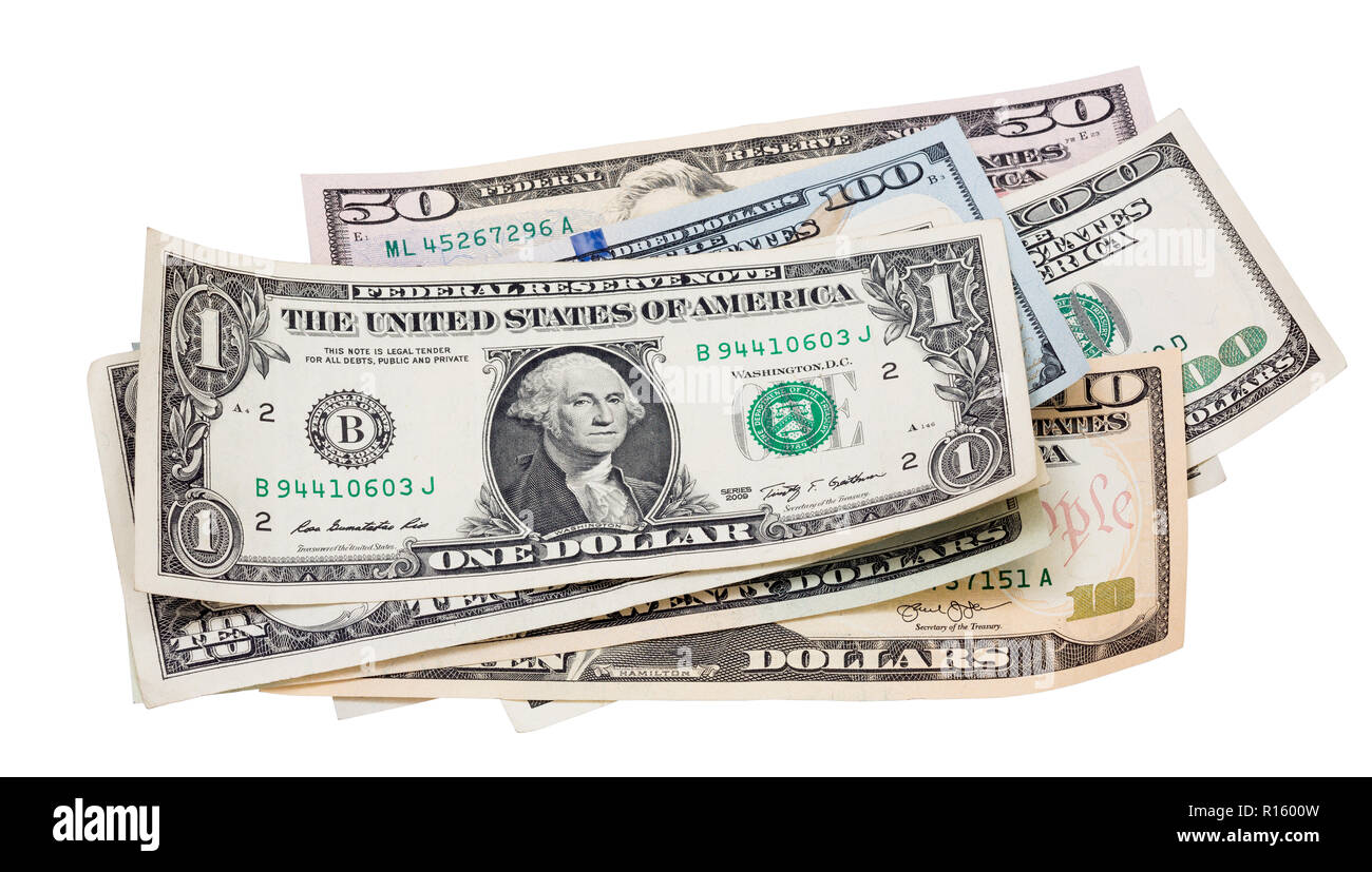 Viele Bündel von US-Dollar Banknoten auf weißem Hintergrund. Dollar isoliert auf Weiss. Stockfoto