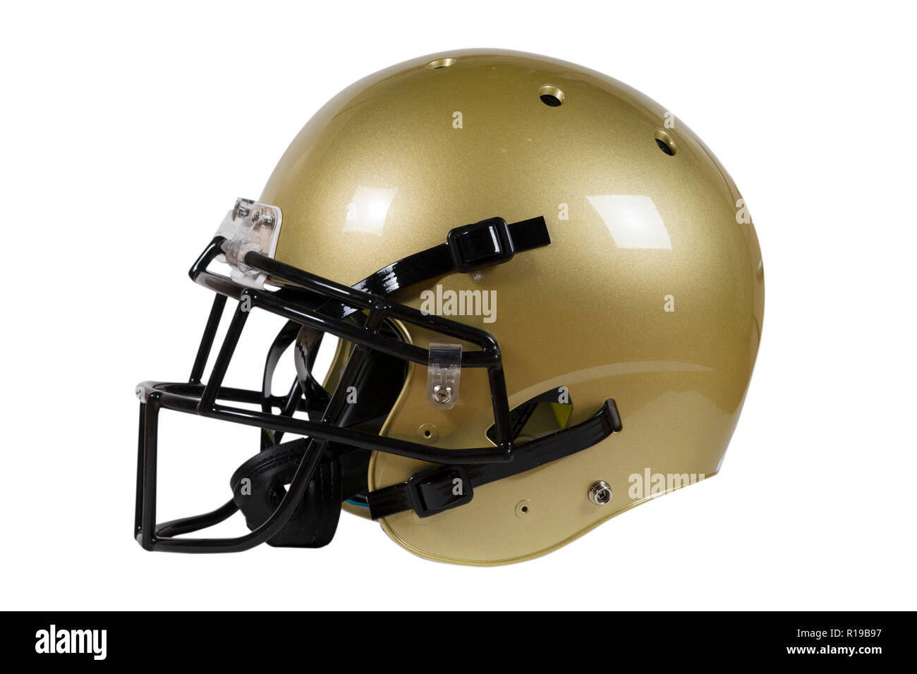 Seitenansicht des American Football Helm auf weißem Hintergrund mit freistellungspfad Vegas Farbe Gold isoliert Stockfoto