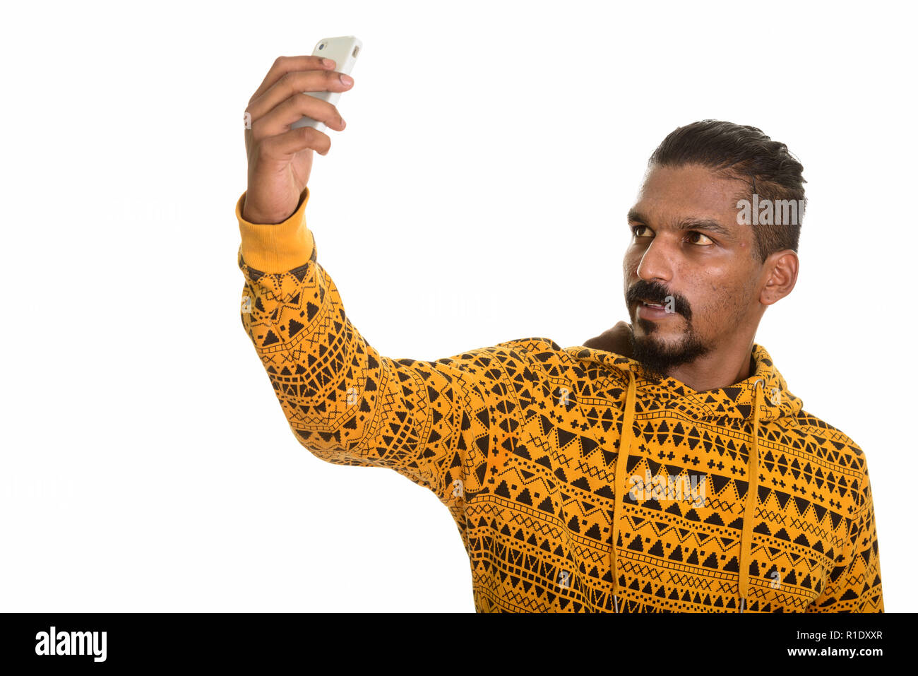 Junge Inder unter selfie mit Handy Stockfoto