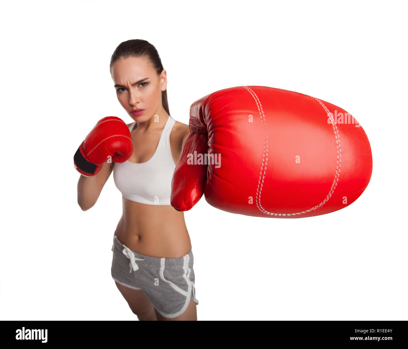 Frau mit Boxhandschuhen Stockfoto