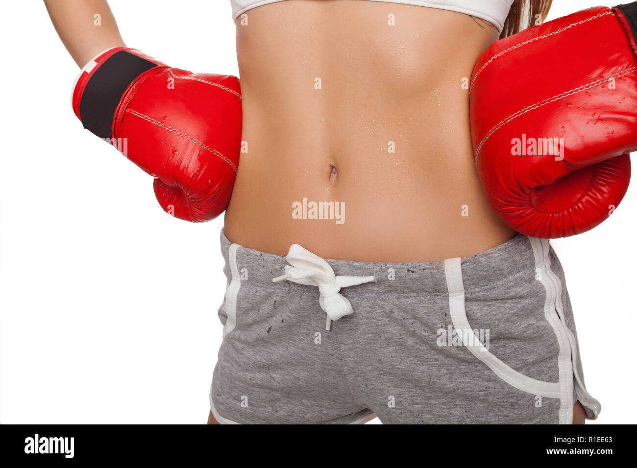 Frau mit Boxhandschuhen Stockfoto
