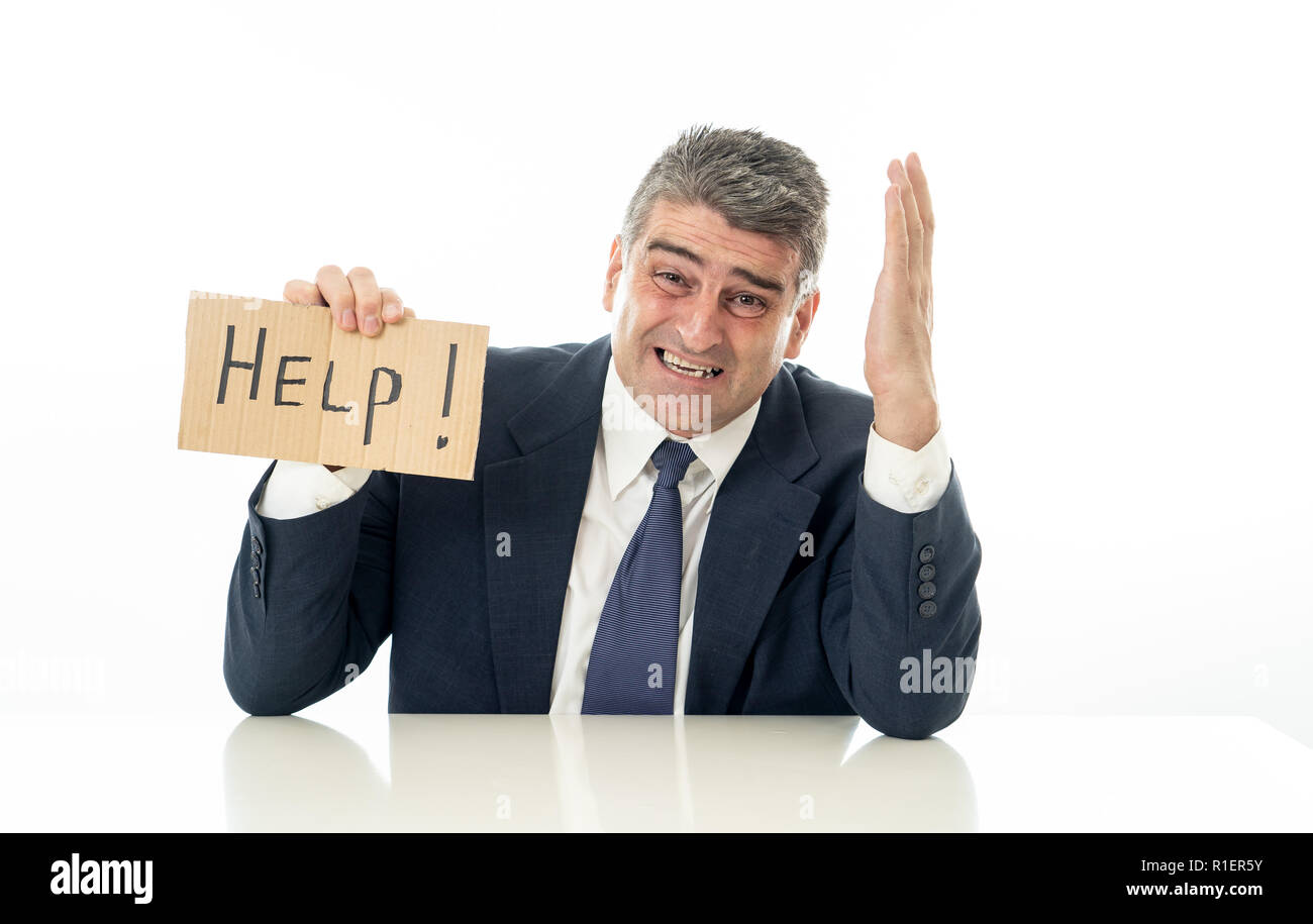 Hilflos reife Geschäftsmann eine Hilfe Anmelden Finanzkrise Arbeitslosigkeit Stress und Depressionen Konzept in weißem Hintergrund. Stockfoto