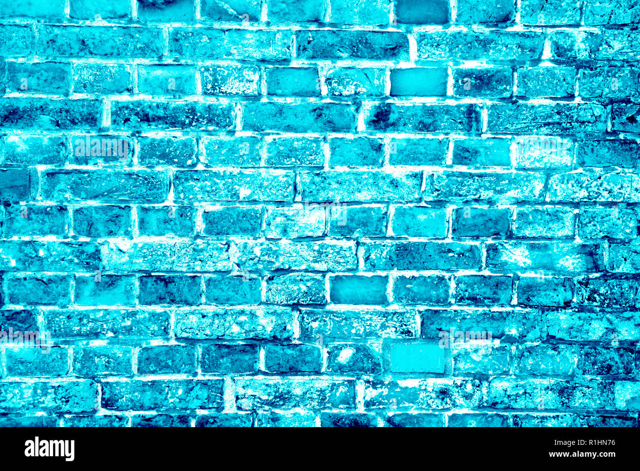 Blau Türkis oder Cyan Ziegelmauer mit unterschiedlichen Farbtönen und ausgezeichneter Sättigung als nahtlose Muster Textur Hintergrund gemalt. Stockfoto