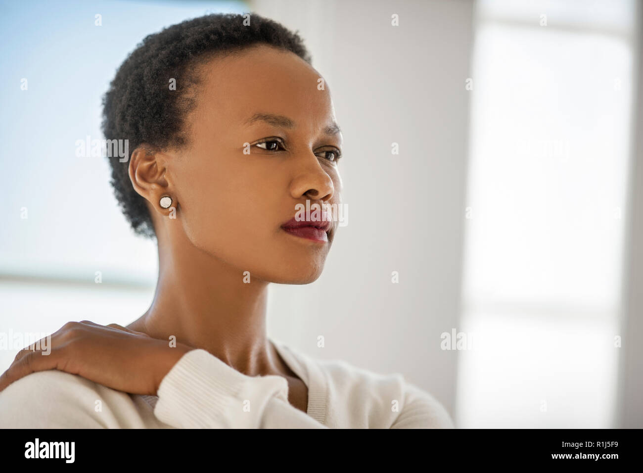 Porträt eines nachdenklichen jungen Frau. Stockfoto