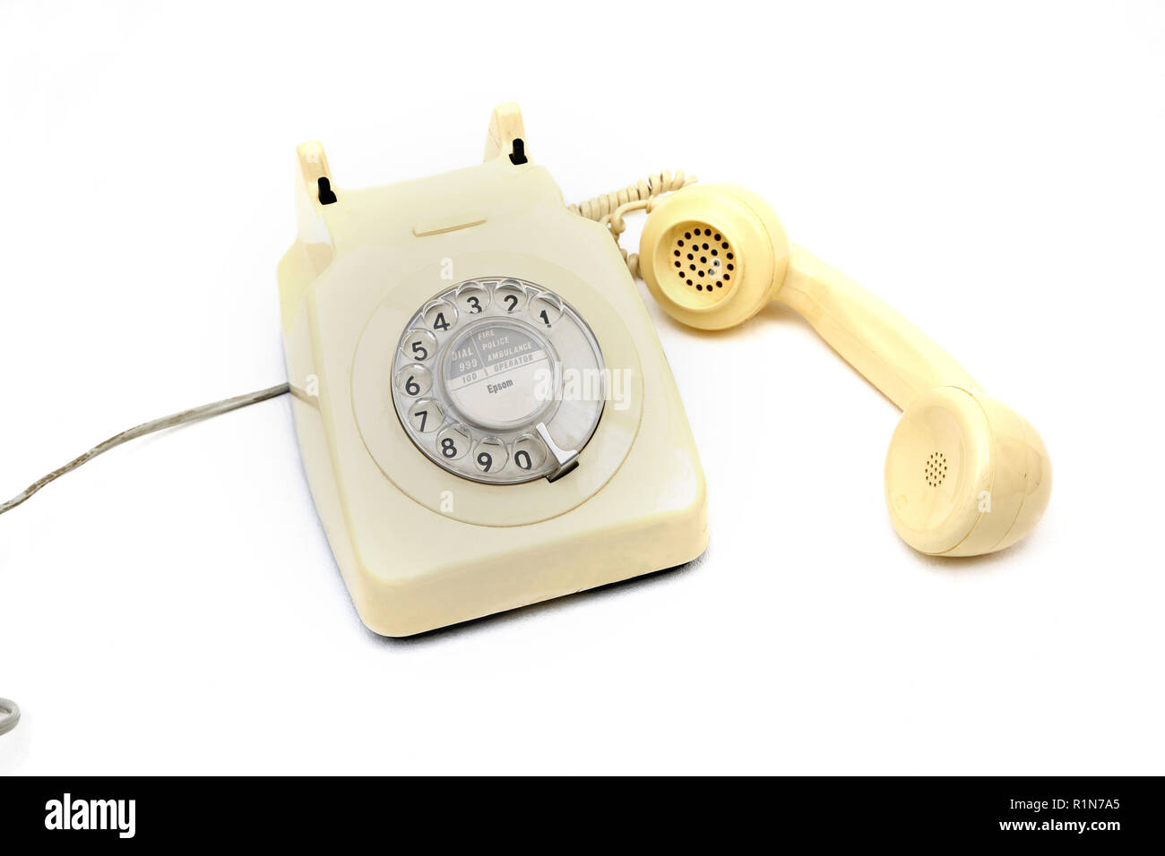 Cremefarbene Vintage Drehschalter Telefon Stockfoto