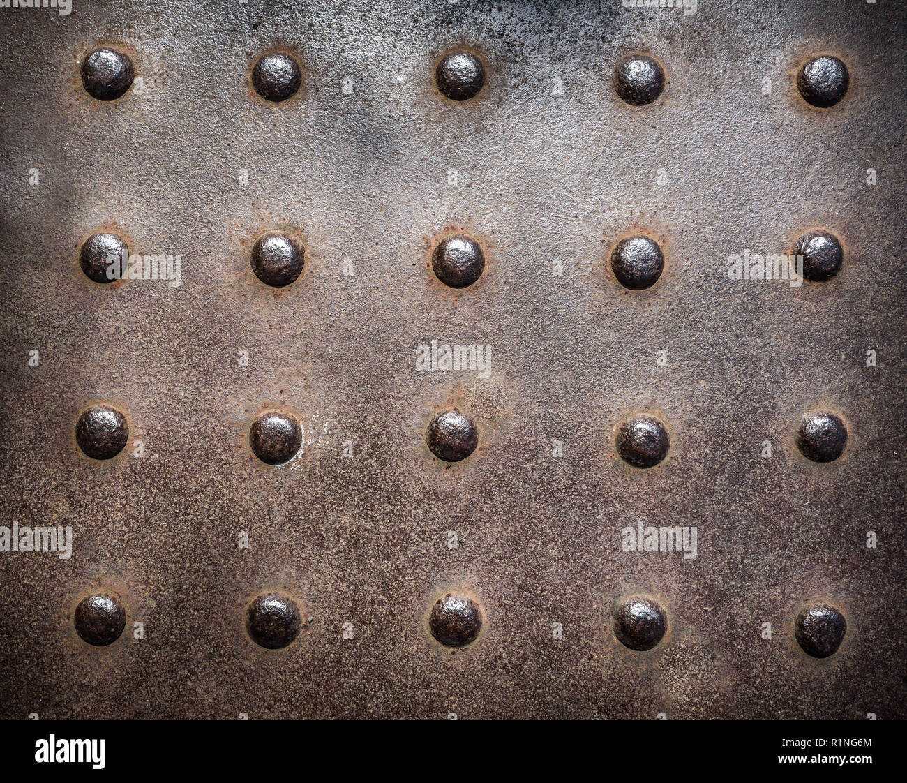 Rostig, verzierte Gusseiserne vintage industrielle Platte Hintergrund. Stockfoto