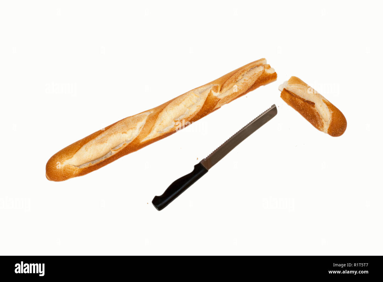 Baguette und Brot Messer mit Brotkrumen Stockfoto