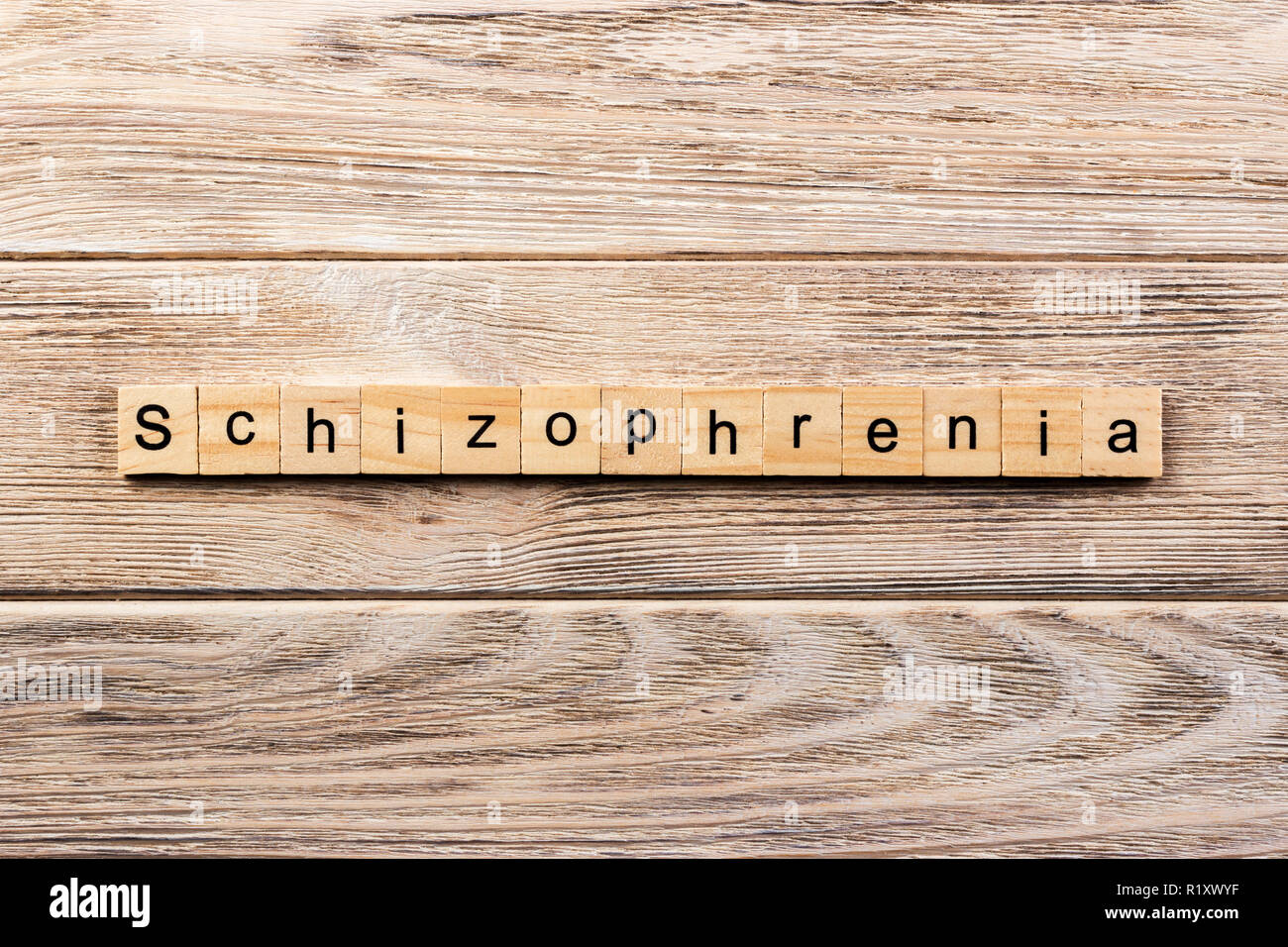 Schizophrenie Wort auf Holz Block geschrieben. Schizophrenie text auf Tisch, Konzept. Stockfoto