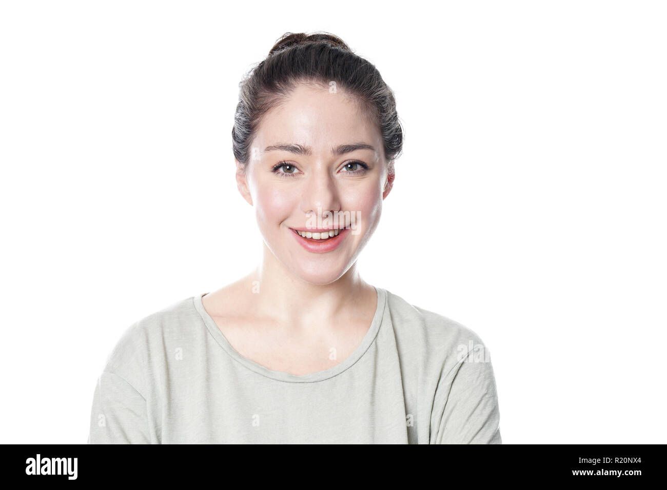 Fröhliche junge Frau in ihrem 20s Lächeln Stockfoto