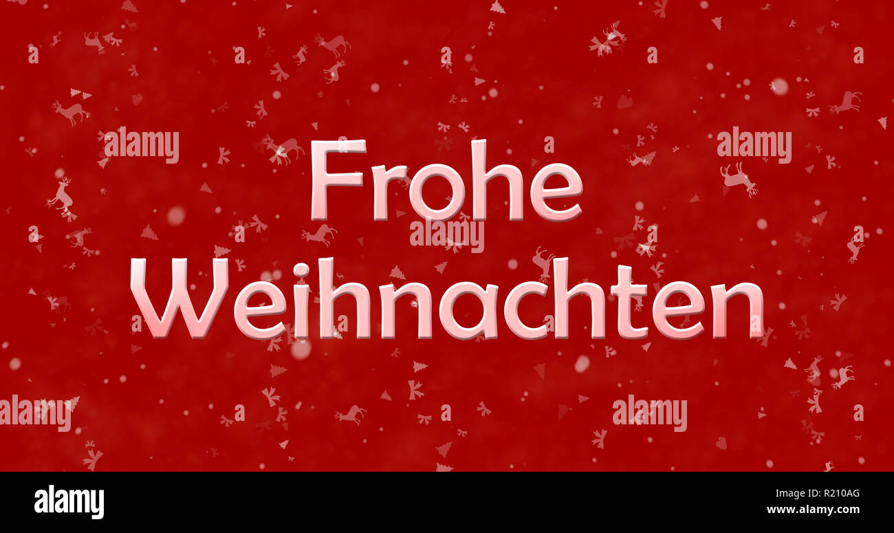Frohe Weihnachten Text in Deutsch "Frohe Weihnachten" auf rotem Hintergrund Stockfoto