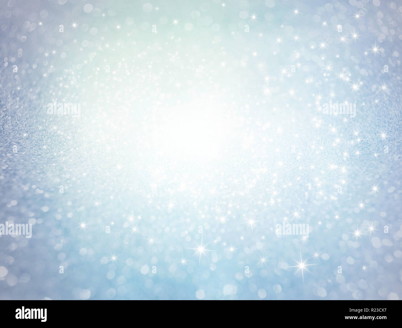 Defokussierten glitzernden Eis Textur Hintergrund mit leuchtenden Sterne explodieren - Festliches Material Stockfoto