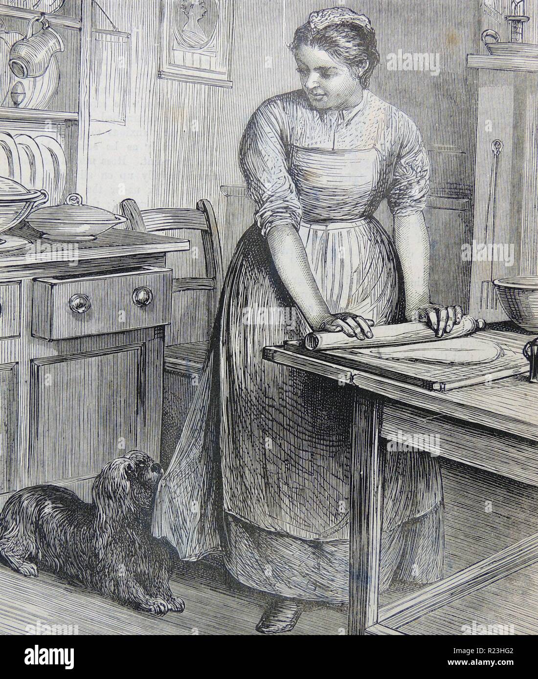 Frau am Küchentisch Teig ausrollen. Gravur, London, 1882. Stockfoto
