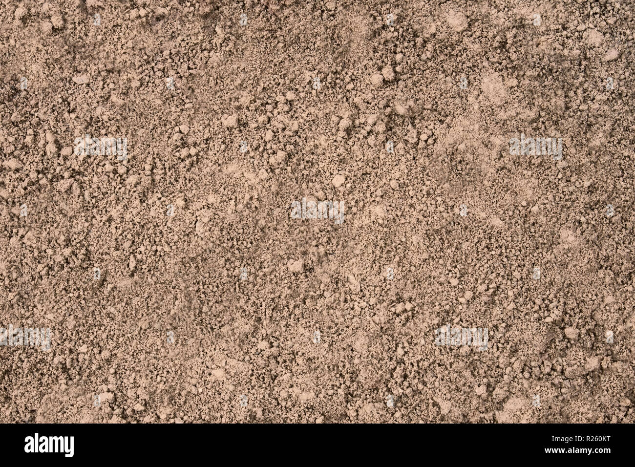 Hintergrund von der Erde aus rotem Lehm nach einem Regen Textur Stockfoto
