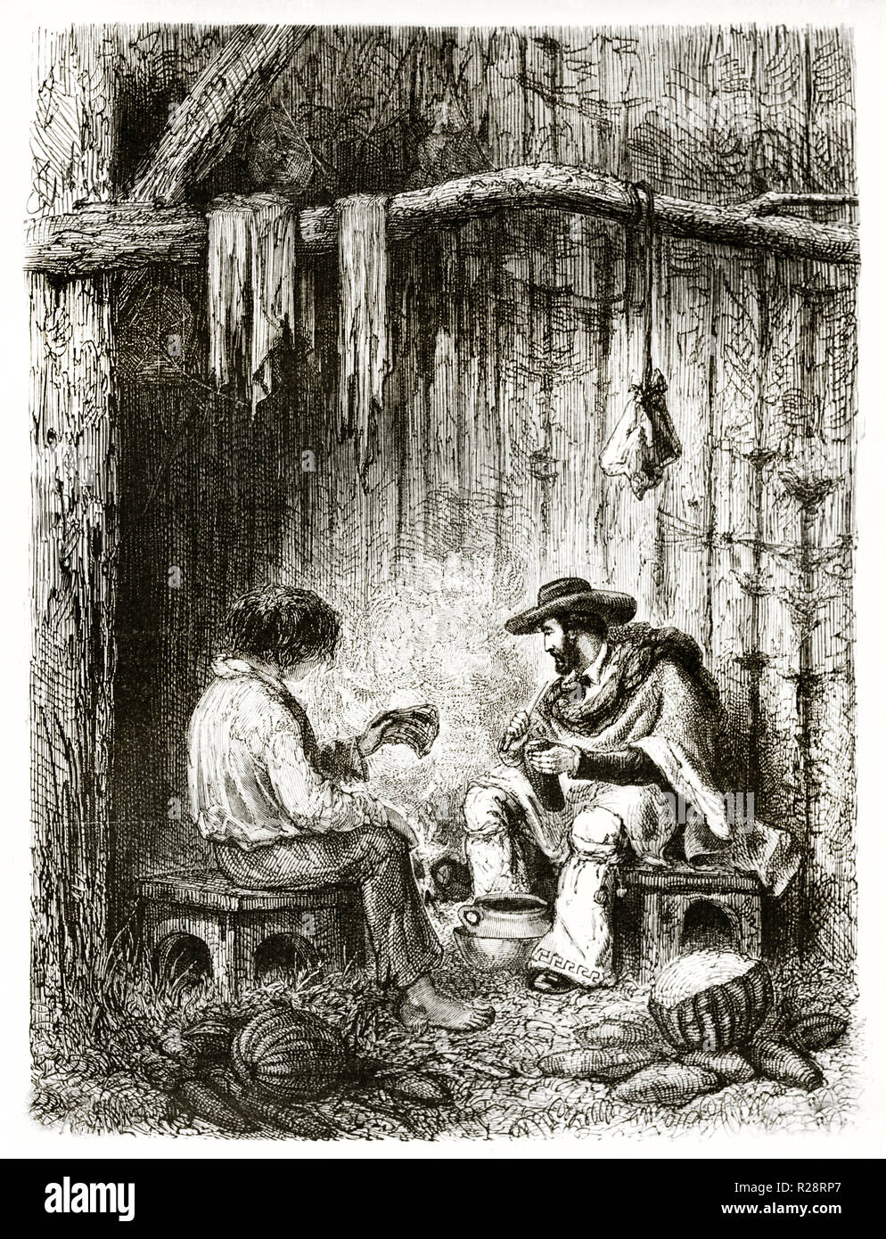 Alte Abbildung der Mann und der Junge Vorbereitung eine Suppe im südlichen Amerikanischen Hütte. Von Riou, Publ. Bei le Tour du Monde, Paris, 1863 Stockfoto