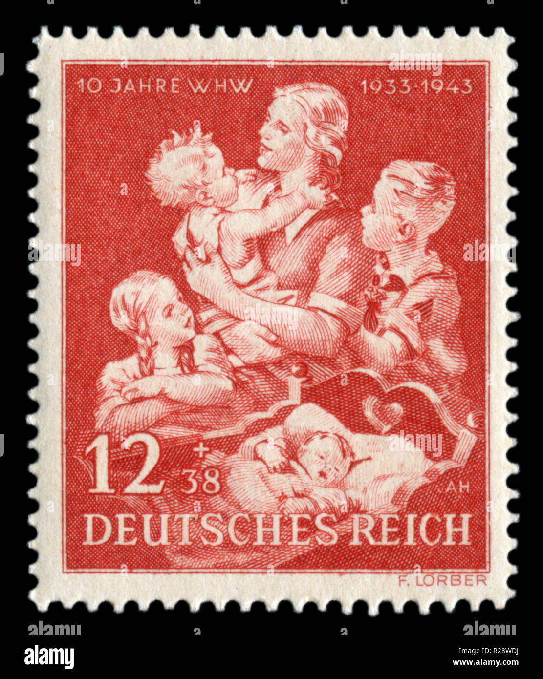 Deutsche historische Stempel: Mutter mit Kind. Jubiläumsausgabe zum 10-jährigen Bestehen der Organisation "winterhilfe" 1943 gewidmet, Deutschland Stockfoto