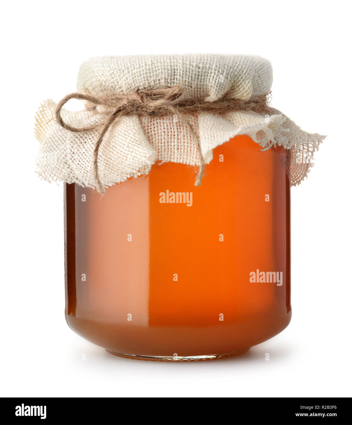 Vorderansicht des Glas Honig jar isoliert auf weißem Stockfoto