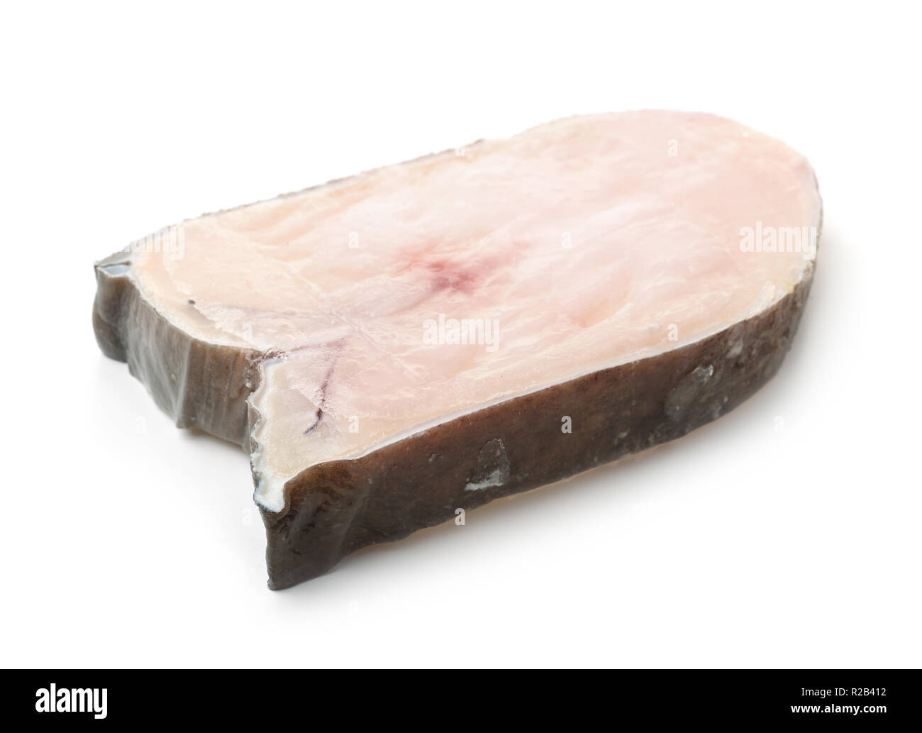Gefroren roher Fisch steak isoliert auf weißem Stockfoto