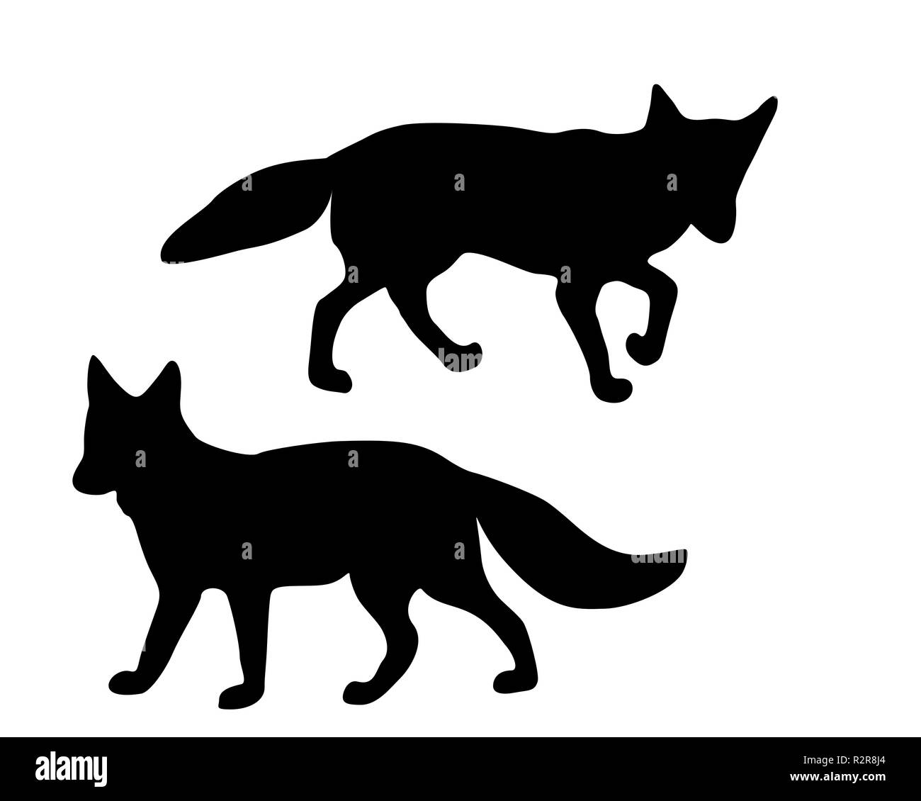 Die scharz Silhouetten von zwei Füchse Stockfoto