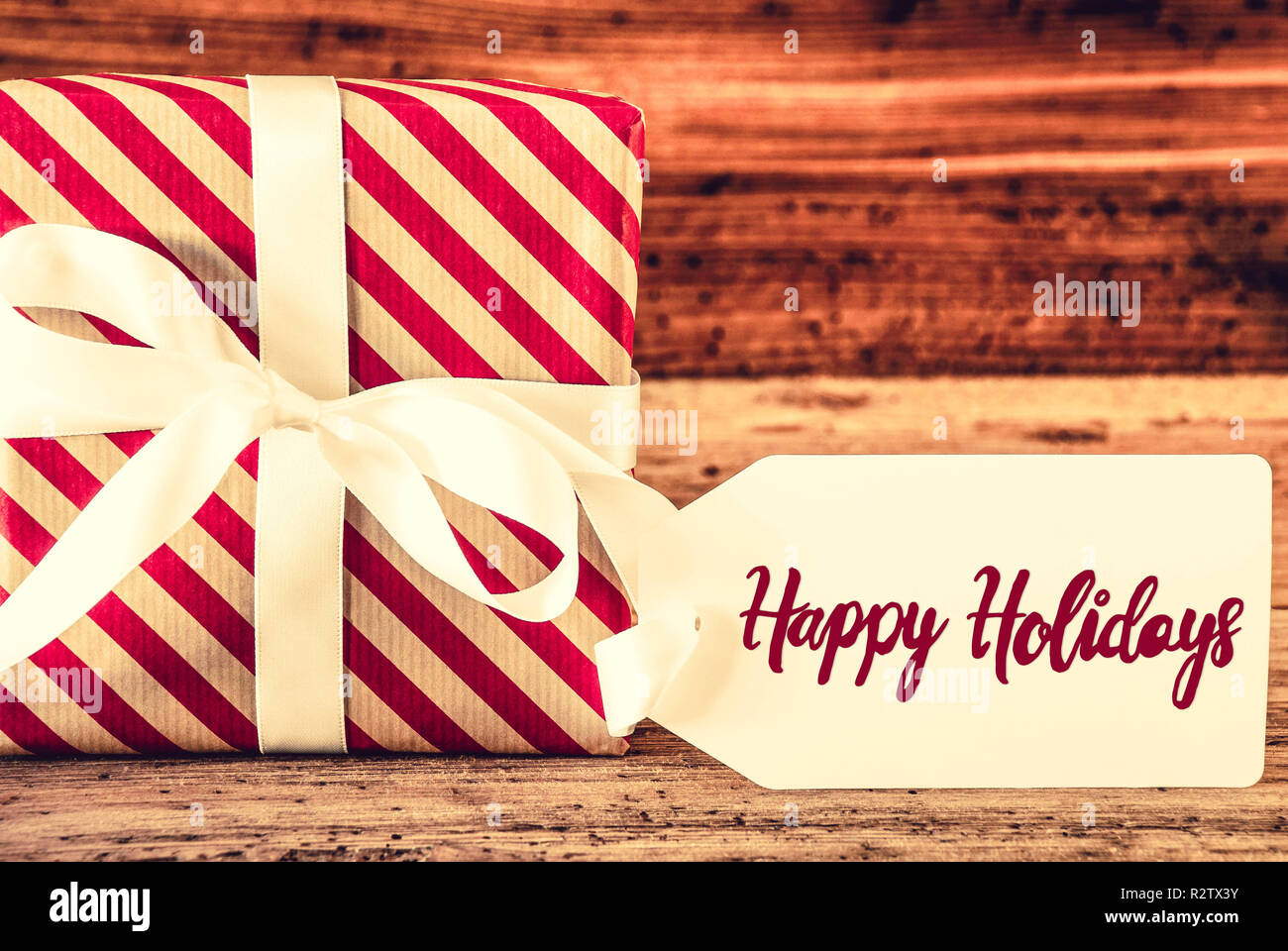 Ein Weihnachtsgeschenk, Englisch Kalligraphie frohe Feiertage Stockfoto