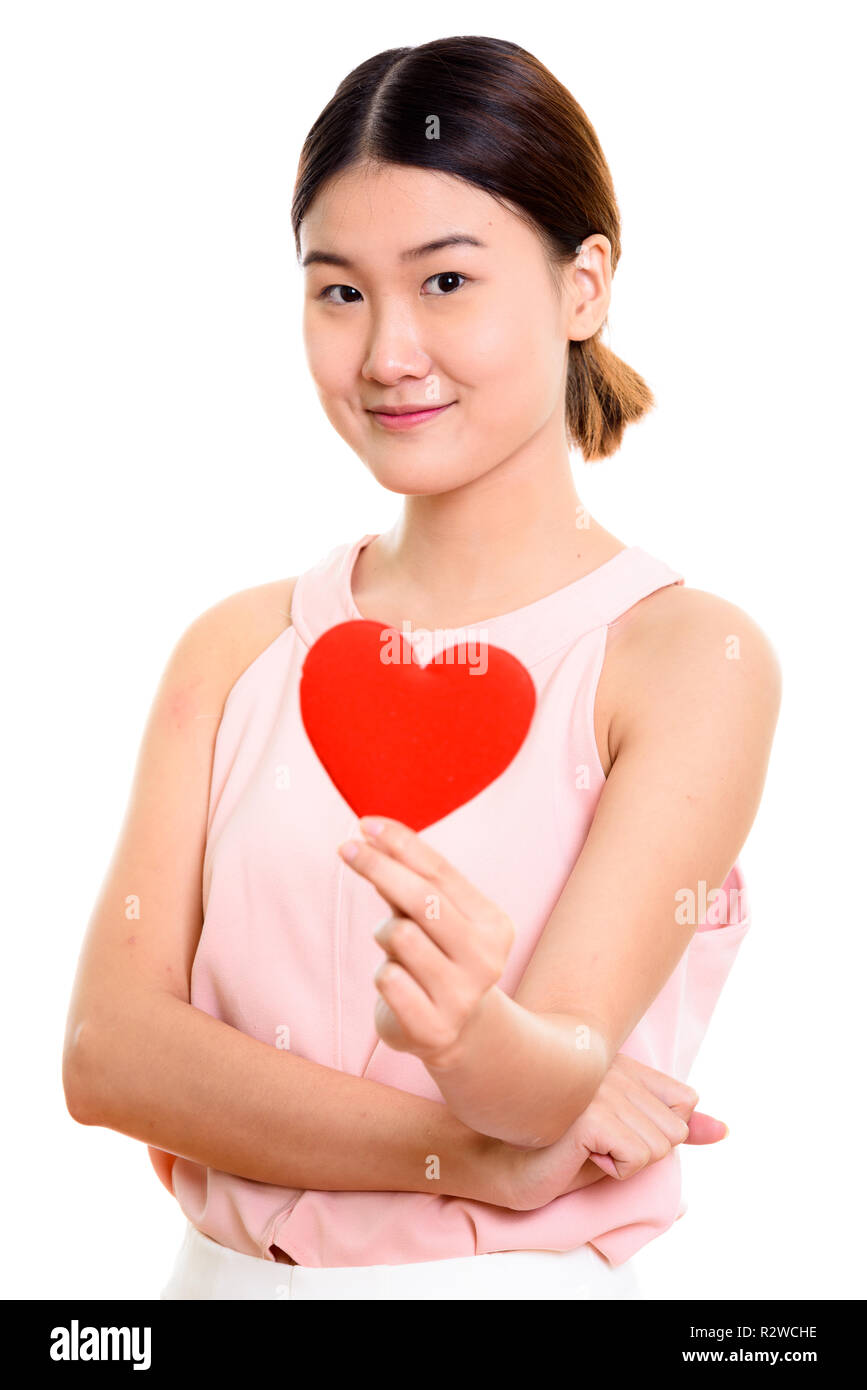 Studio erschossen Der junge schöne asiatische Frau mit roten Herzen Stockfoto