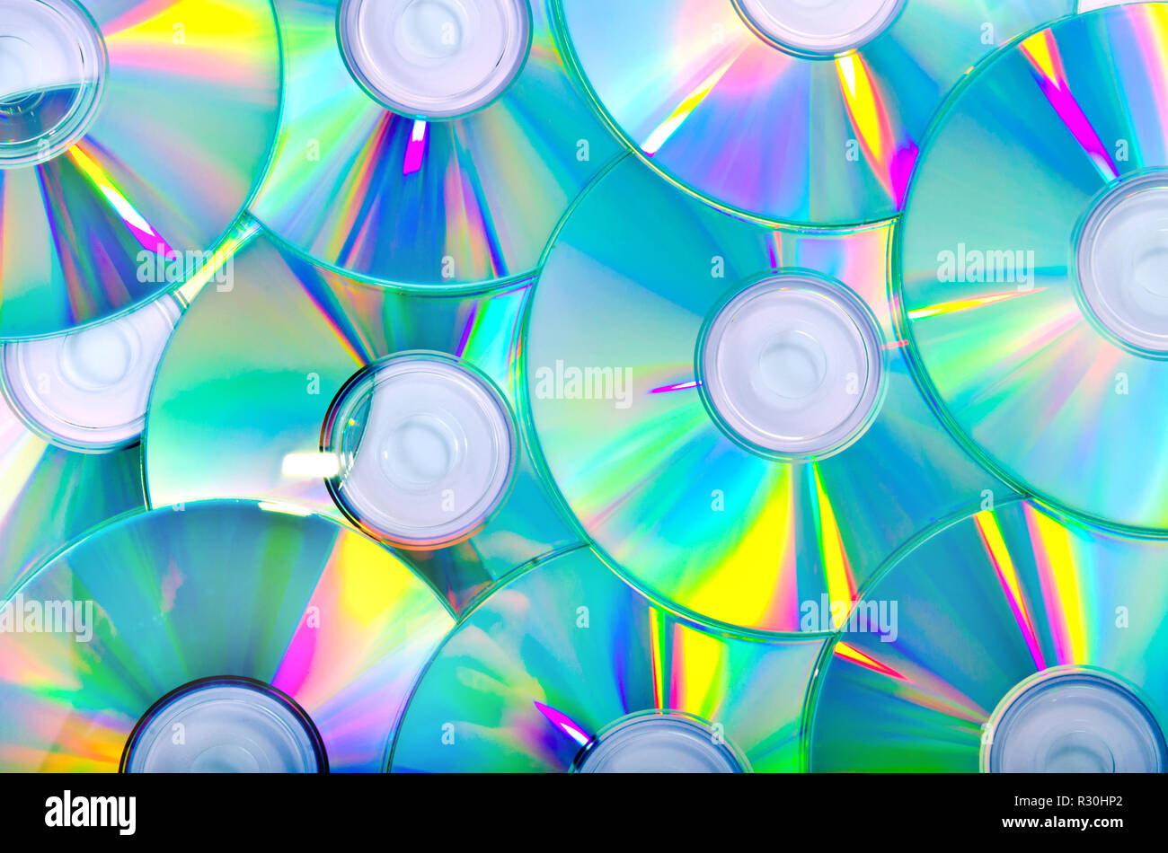 Eine Menge Compact Disks als Hintergrund Stockfoto