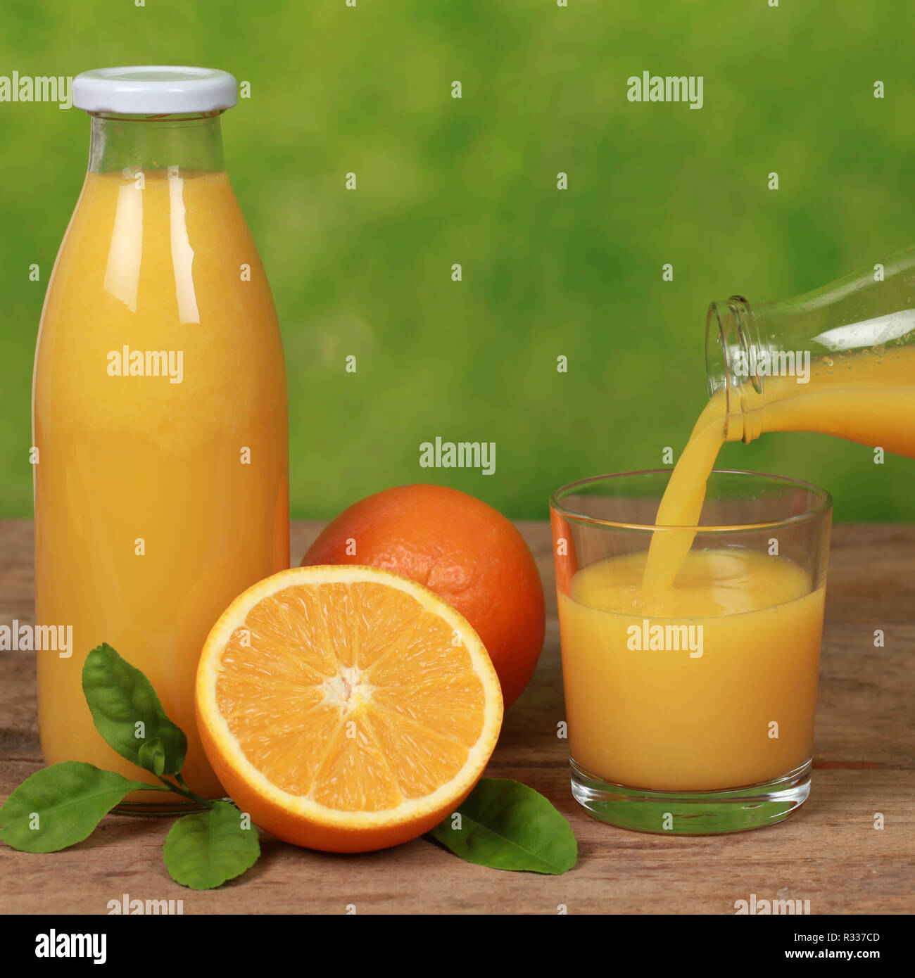 Orangen und Orangensaft Stockfoto
