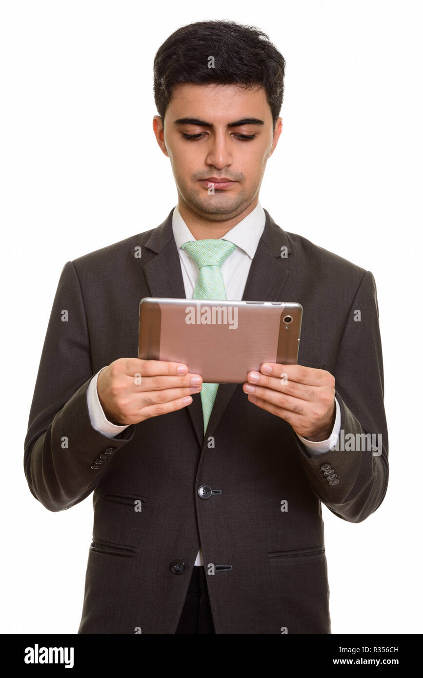 Jungen schönen persischen Kaufmanns Holding digital Tablet Stockfoto