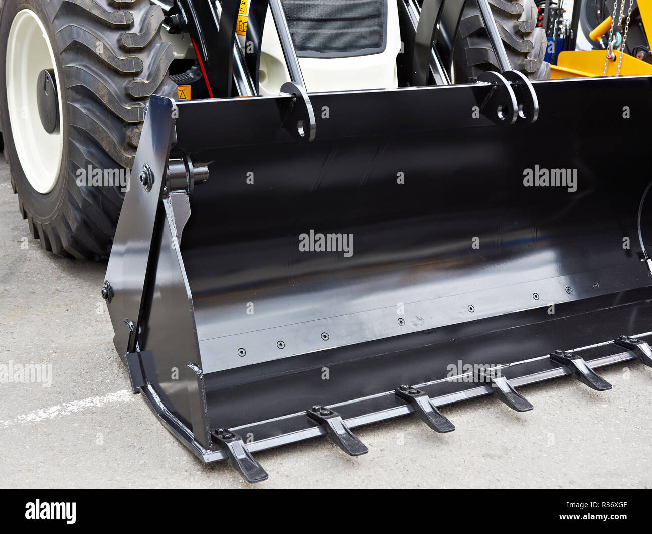 Eimer neue Mini Loader auf dem Messegelände Stockfoto