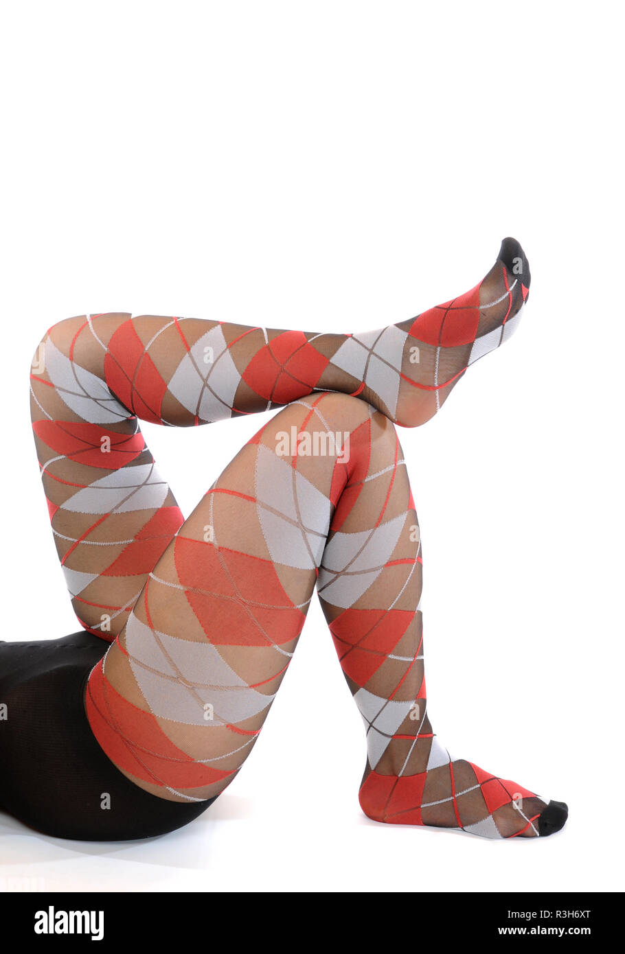 Bunte Strumpfhosen/lustige Beine auf Weiß Stockfotografie - Alamy