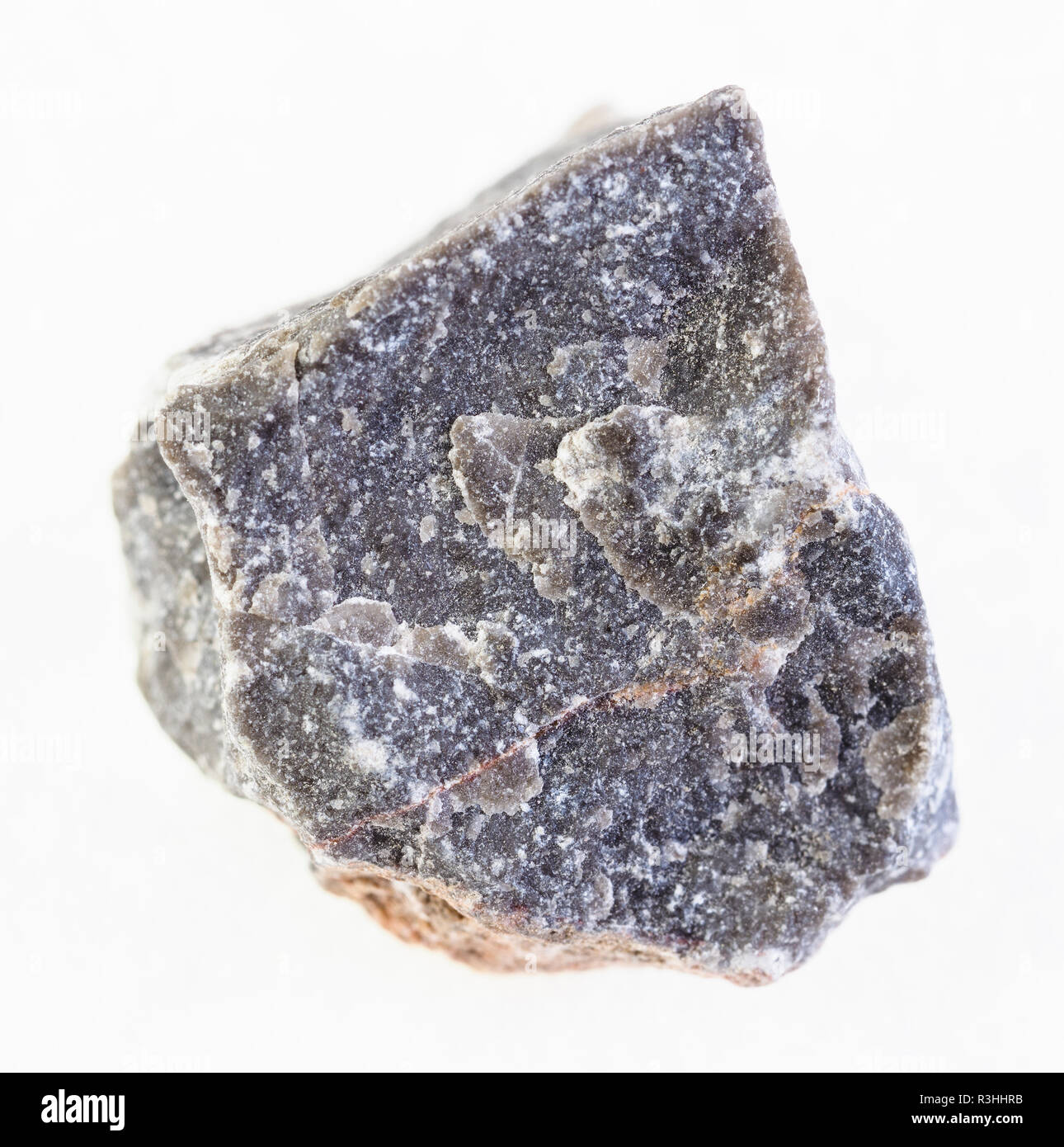 Makrofotografie von natürlichen Mineral aus geologische Sammlung - Raue Kalk Stein auf weißem Hintergrund Stockfoto