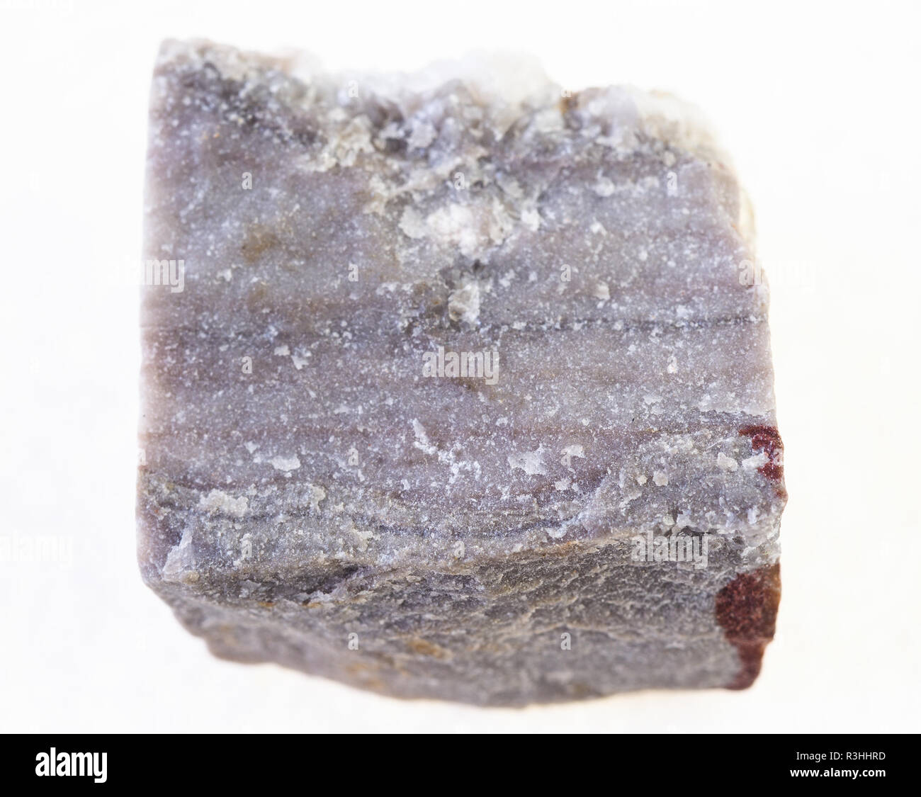 Makrofotografie von natürlichen Mineral aus geologische Sammlung - grobe Rhyolith Stein auf weißem Hintergrund Stockfoto