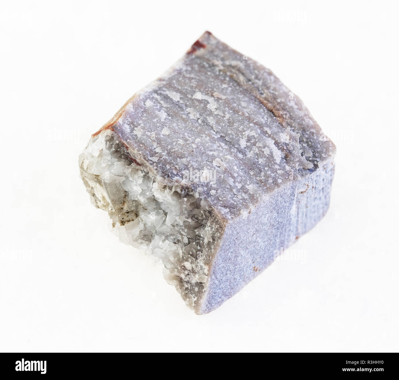 Makrofotografie von natürlichen Mineral aus geologische Sammlung - raw Rhyolith Stein auf weißem Hintergrund Stockfoto