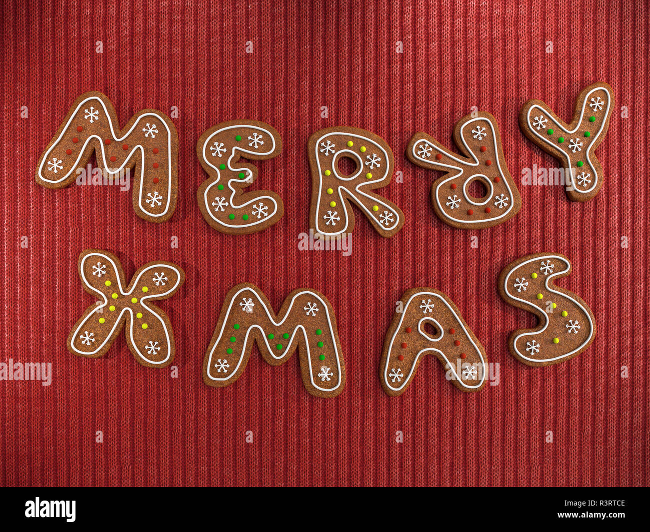 Frohe Weihnachten Gruß von Lebkuchen Kekse mit Zuckerguss auf Rot gestrickte Wolle Stoff Hintergrund verziert Stockfoto