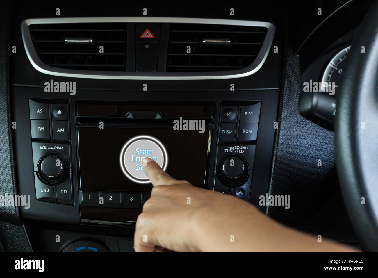 Closeup Hand drücken, starten Sie den Motor, modernes Auto Stockfoto