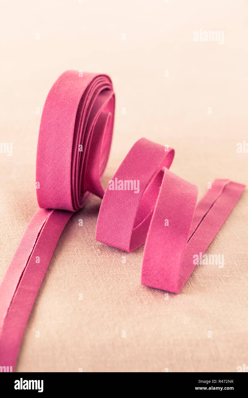 Rosa Baumwolle Bias binding tape Nahaufnahme Stockfoto