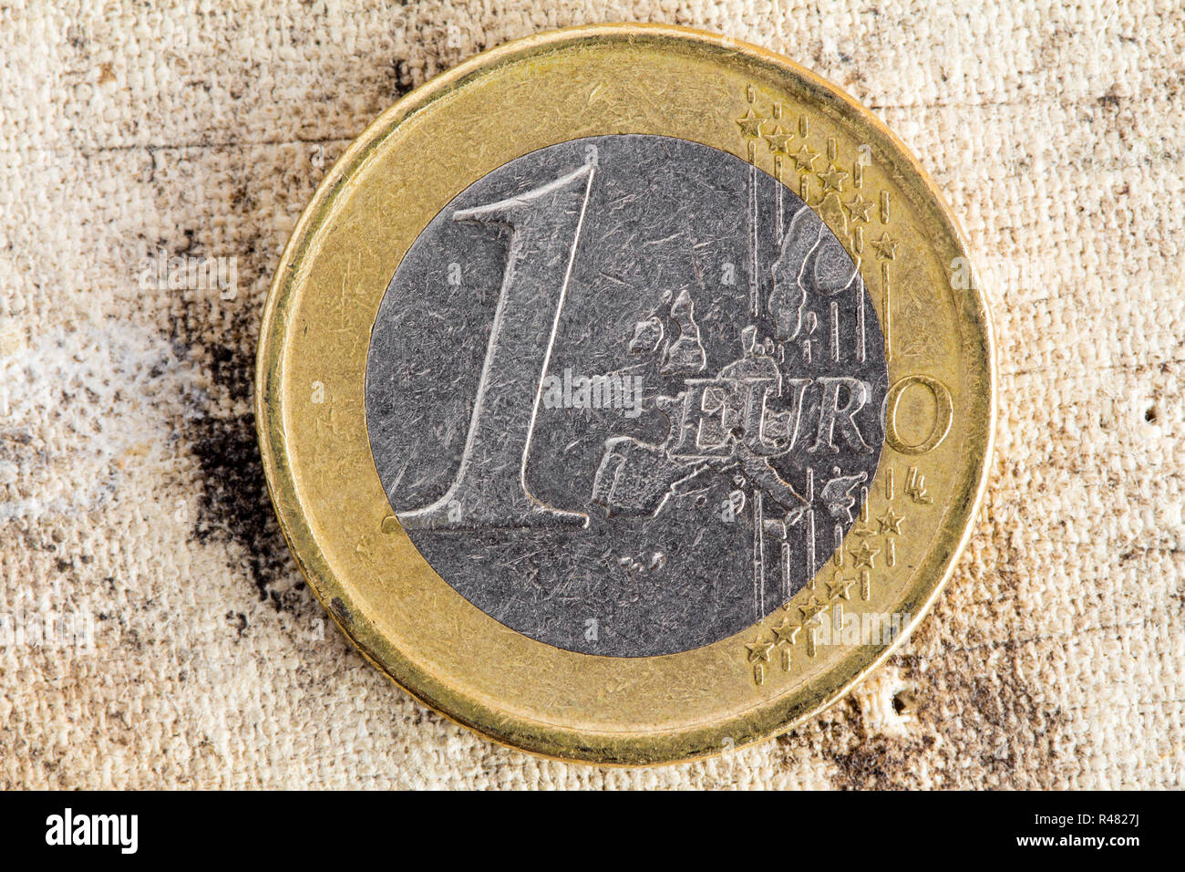 Euro Münze auf alten Leinwand Stockfoto
