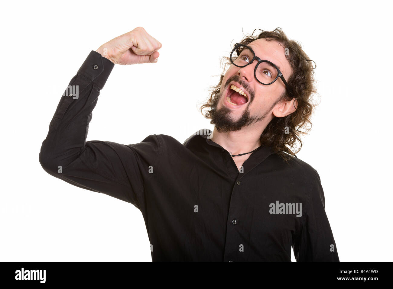 Portrait von Stattlichen happy Crazy kaukasischen Mann verbiegen Muskeln Stockfoto