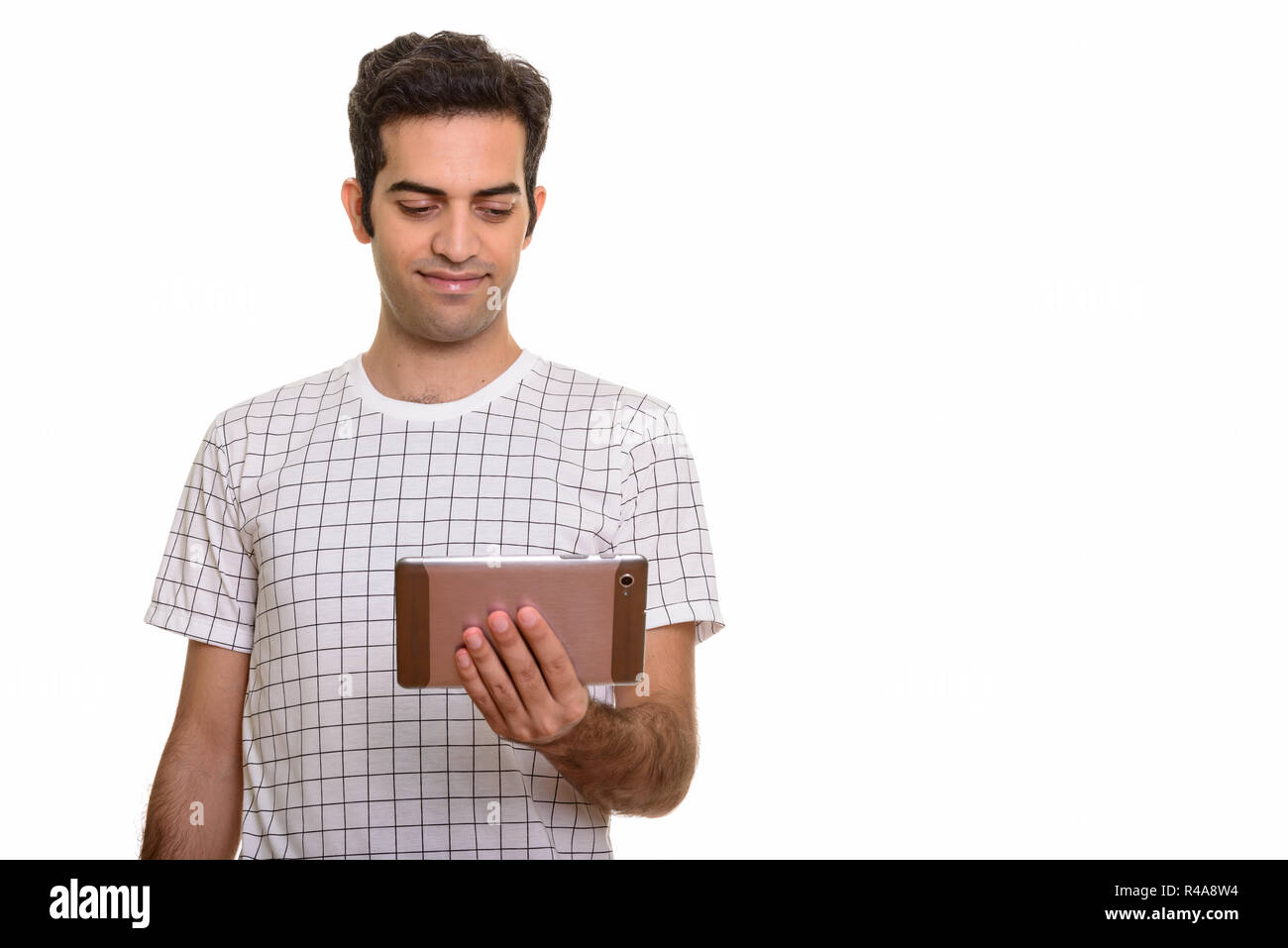 Porträt der jungen Persischen Mann mit digitalen Tablet Stockfoto