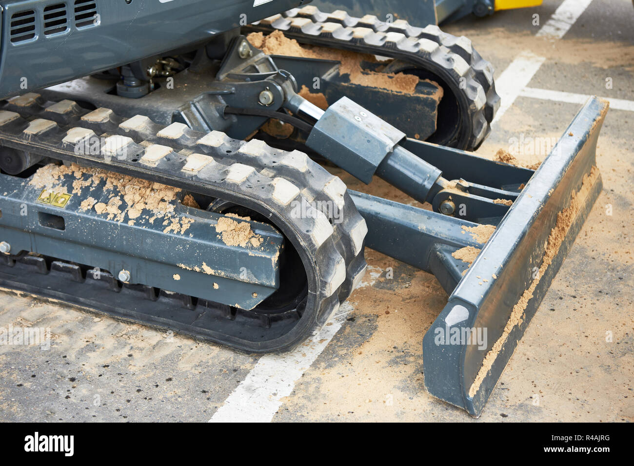 Crawler mini Traktor mit Lader Stockfoto