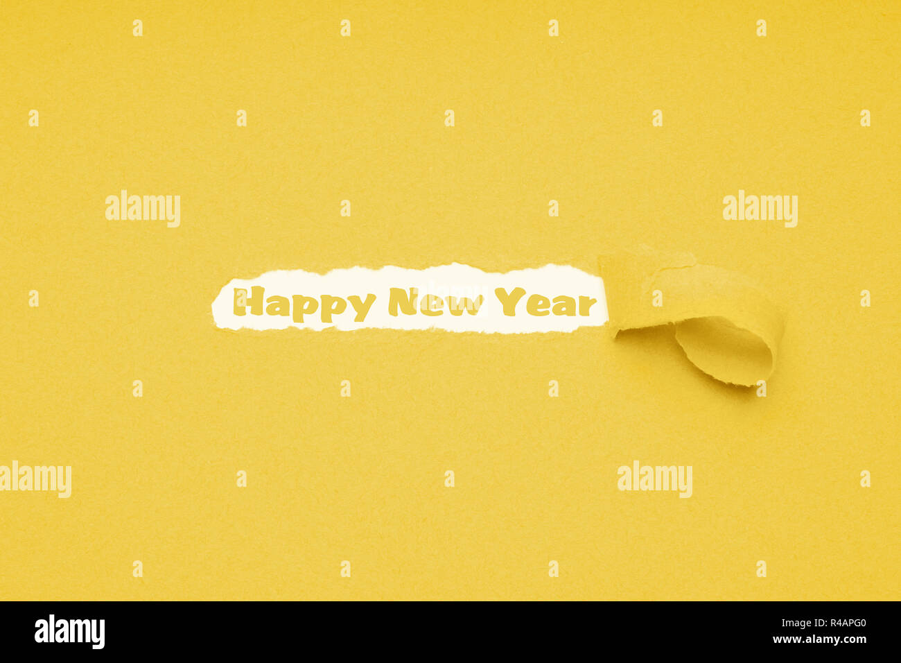 Frohes neues Jahr Text auf gelbem Papier Hintergrund Stockfoto