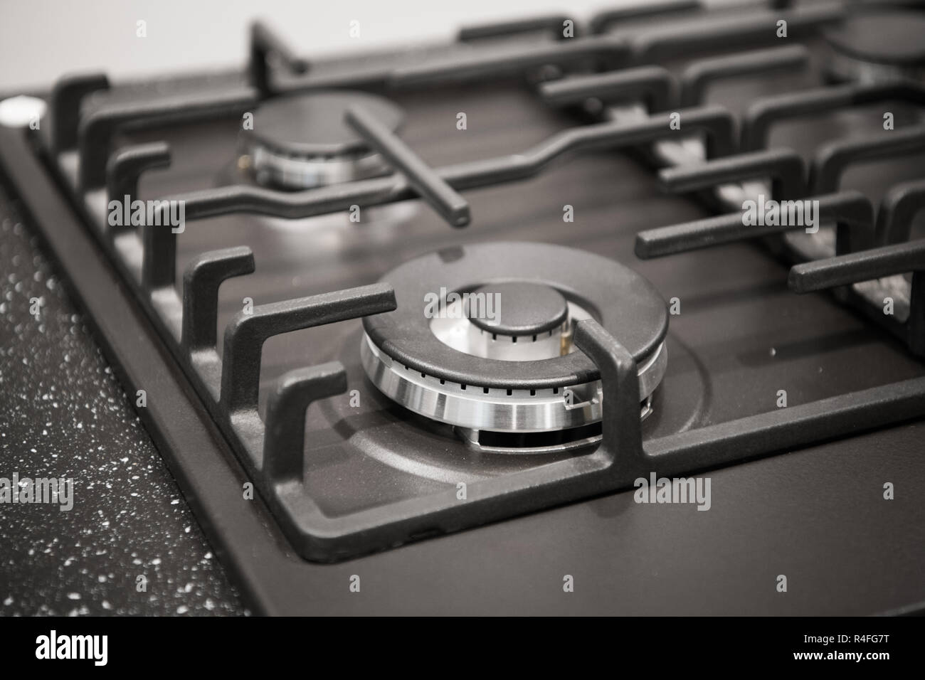 Nahaufnahme eines modernen glänzenden Metall Gasherd Stockfoto