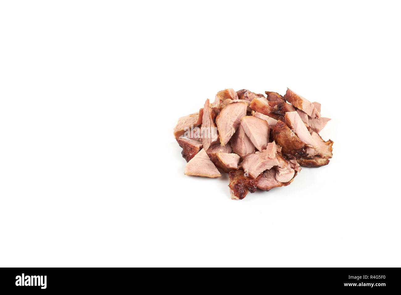 Stücke von gebratenem Putenfleisch, auf weißem Hintergrund. Stockfoto