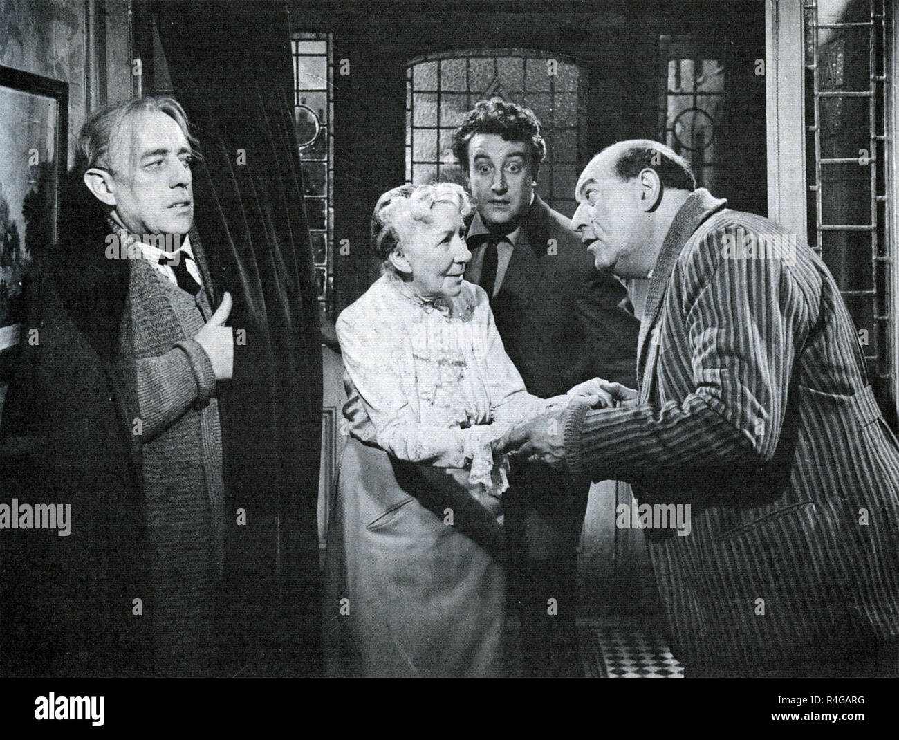 Die LADYKILLERS 1955 Ealing Studios Film mit Von links: Alec Guinness, Katy Johnson, Peter Sellers, Cecil Parker Stockfoto