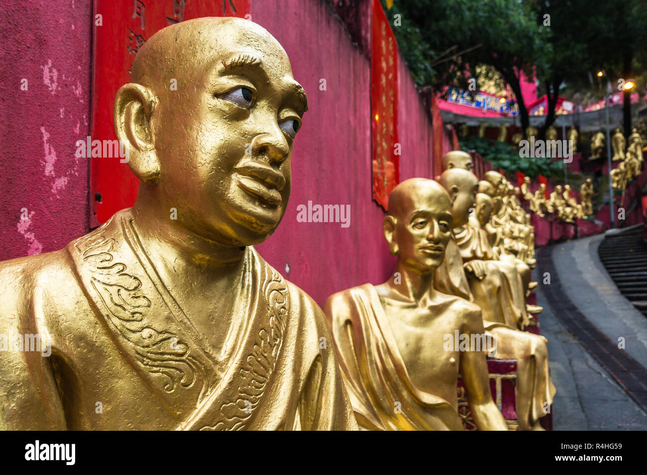 Nahaufnahme von einem goldenen Buddha Statue an zehn Tausend Buddhas Kloster (man Fett Tsz), Hong Kong, Sha Tin, neue Gebiete Stockfoto